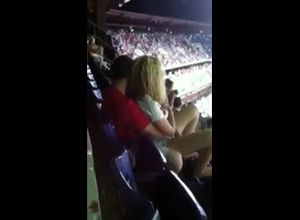 Public hookup in stadium during football